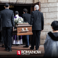 Pallbearers carrying the coffin of a someone who died due to negligence in Maine