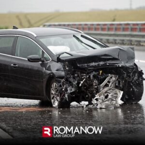 In the aftermath of a Lyft accident in Miami, a black car sits smashed up in the road